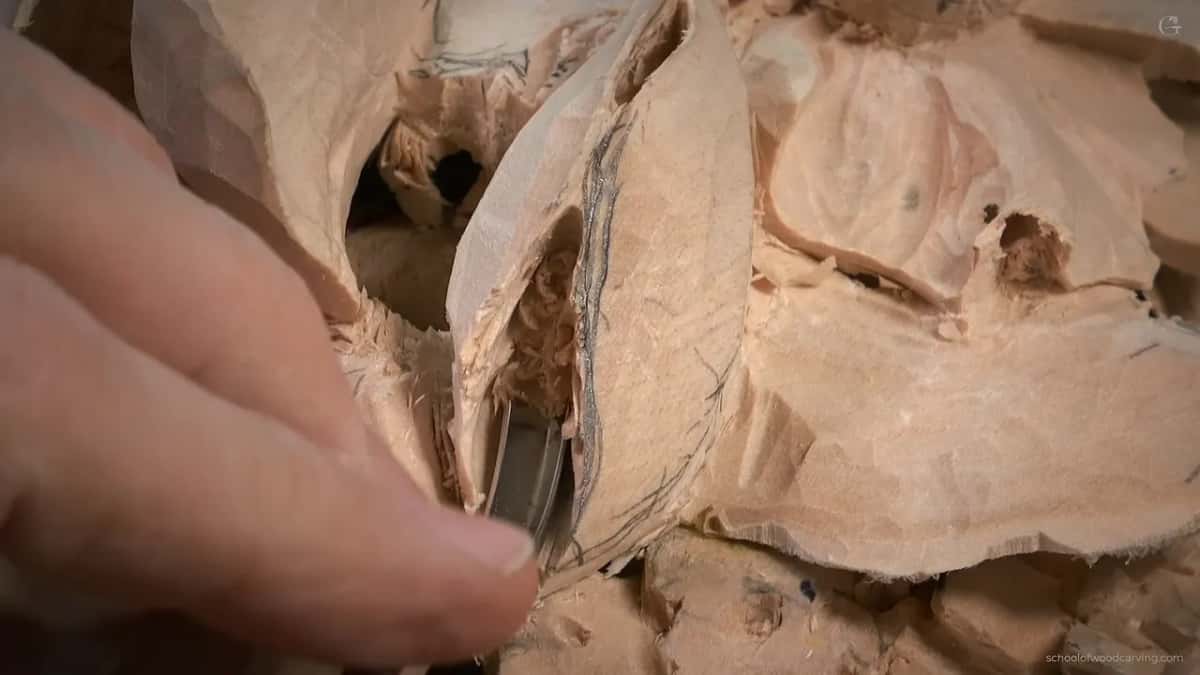 Curved blade steered by a fingertip into the gap