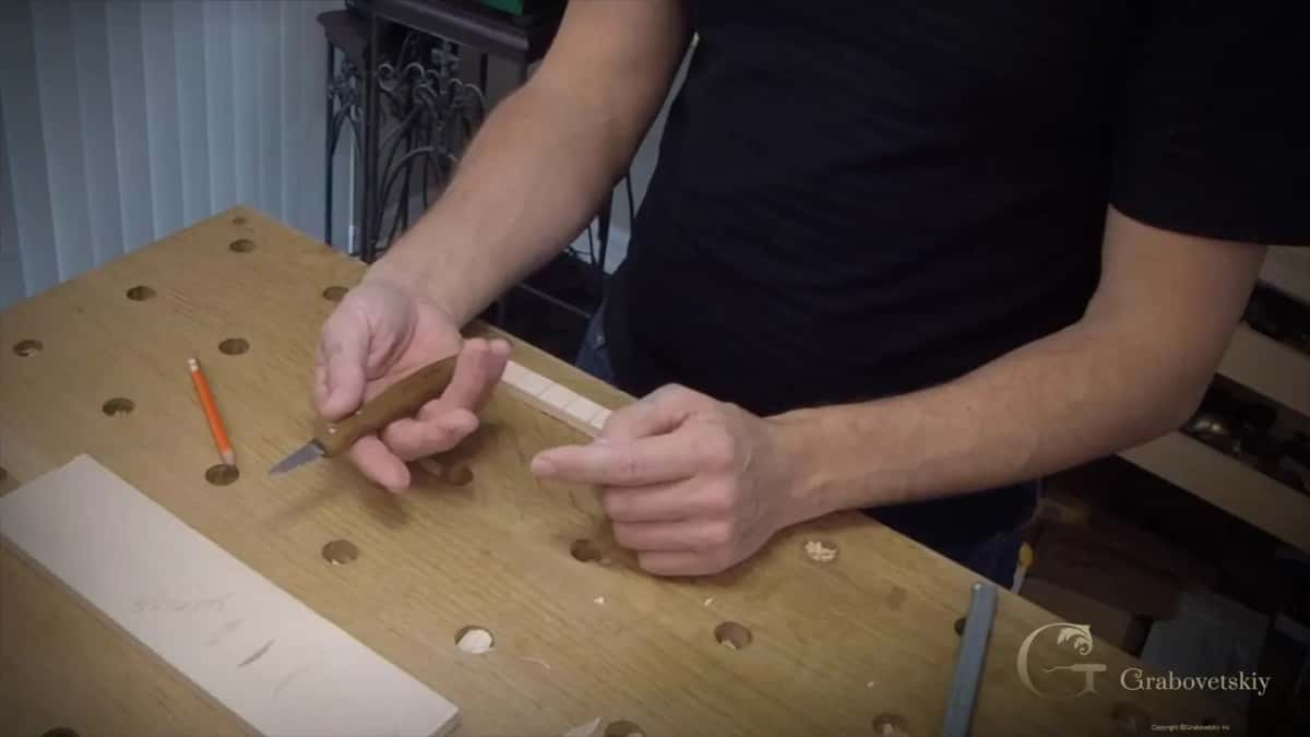 Held with its point away from the body now, because the molding is a different technique