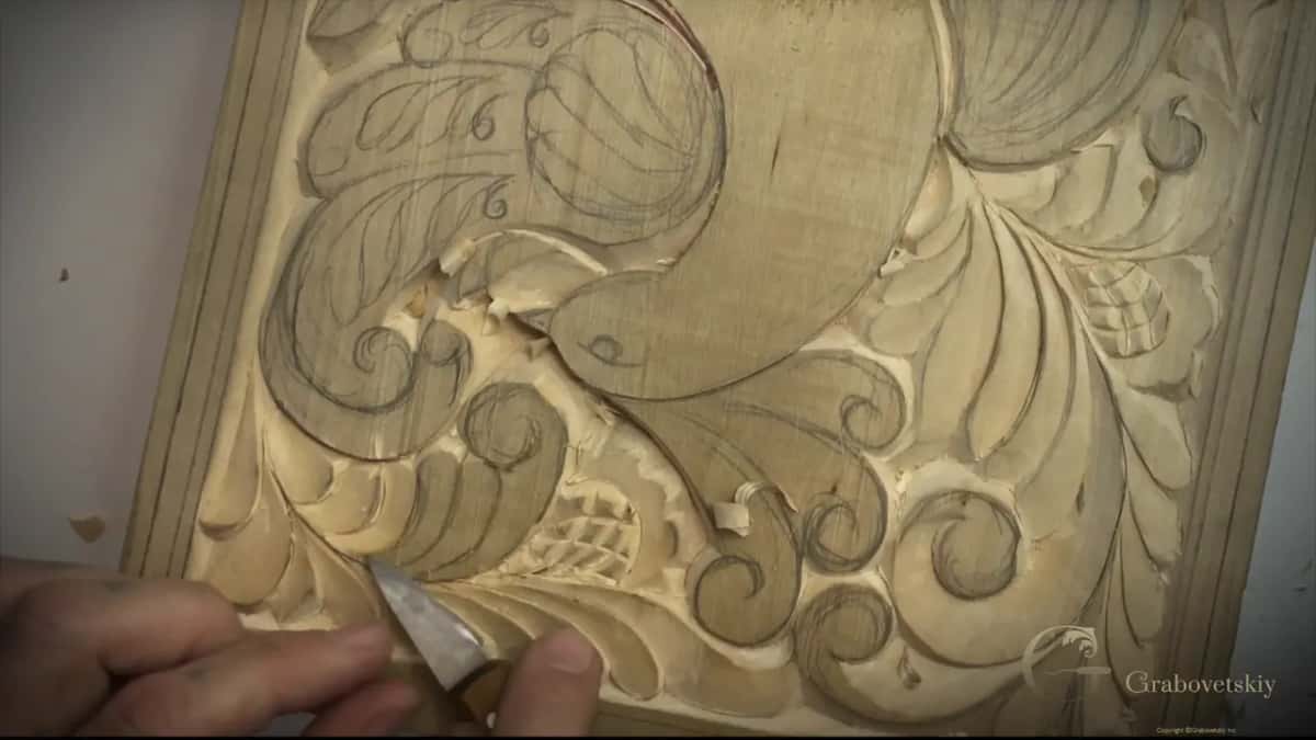 Curled chips on the board as the blade works low among the curls