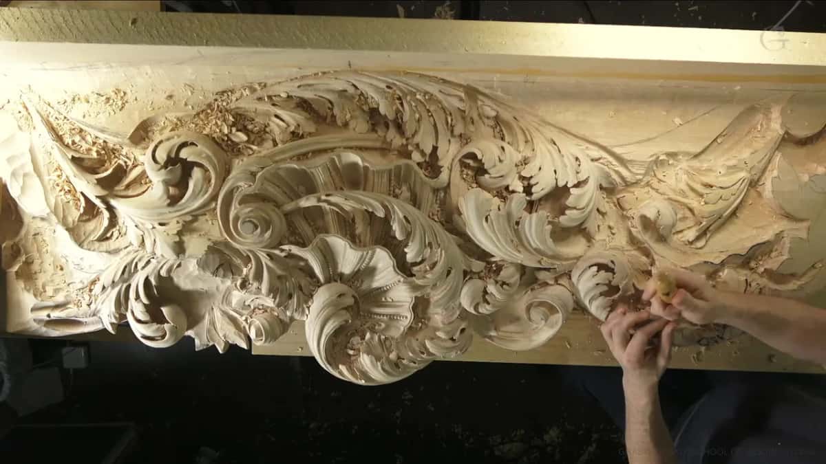Both hands low on the right side of the panel