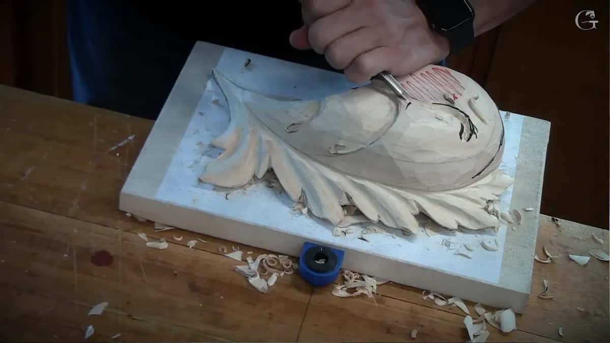 Gouge at work on top of the dome, chips scattered over the white board