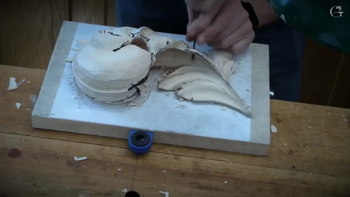 Thin blade going in where dome and leaf meet