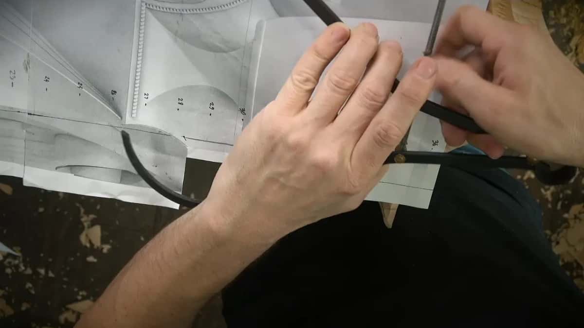 Calipers opened across the paper print