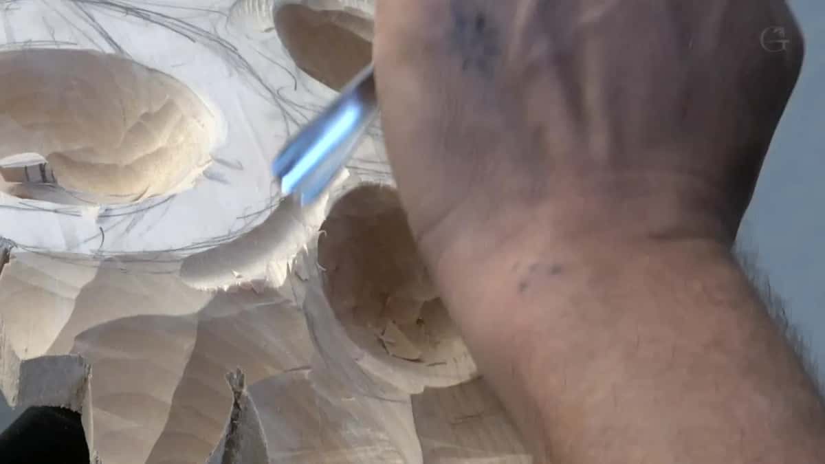 A bright gouge sits at the rim of the big ring while a smaller hollow lies open just below it