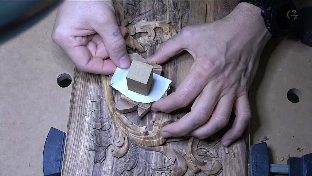 Poplar block pressed onto a paper square on the back of the olive flower