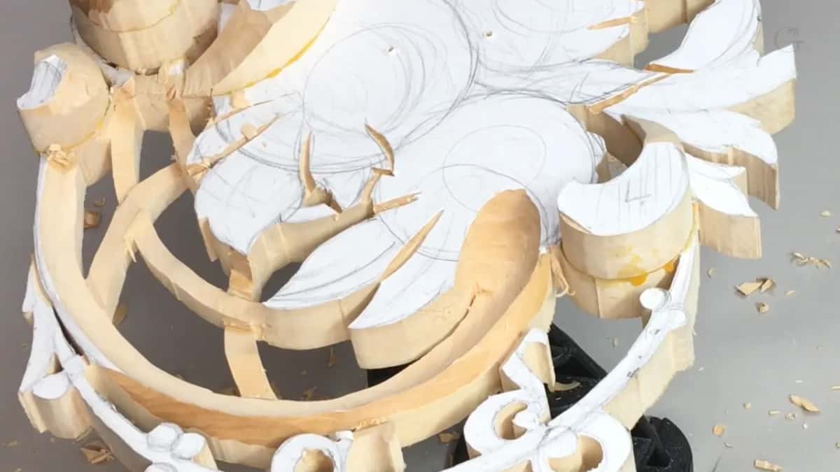 Curved straps under paper flowers, low angle