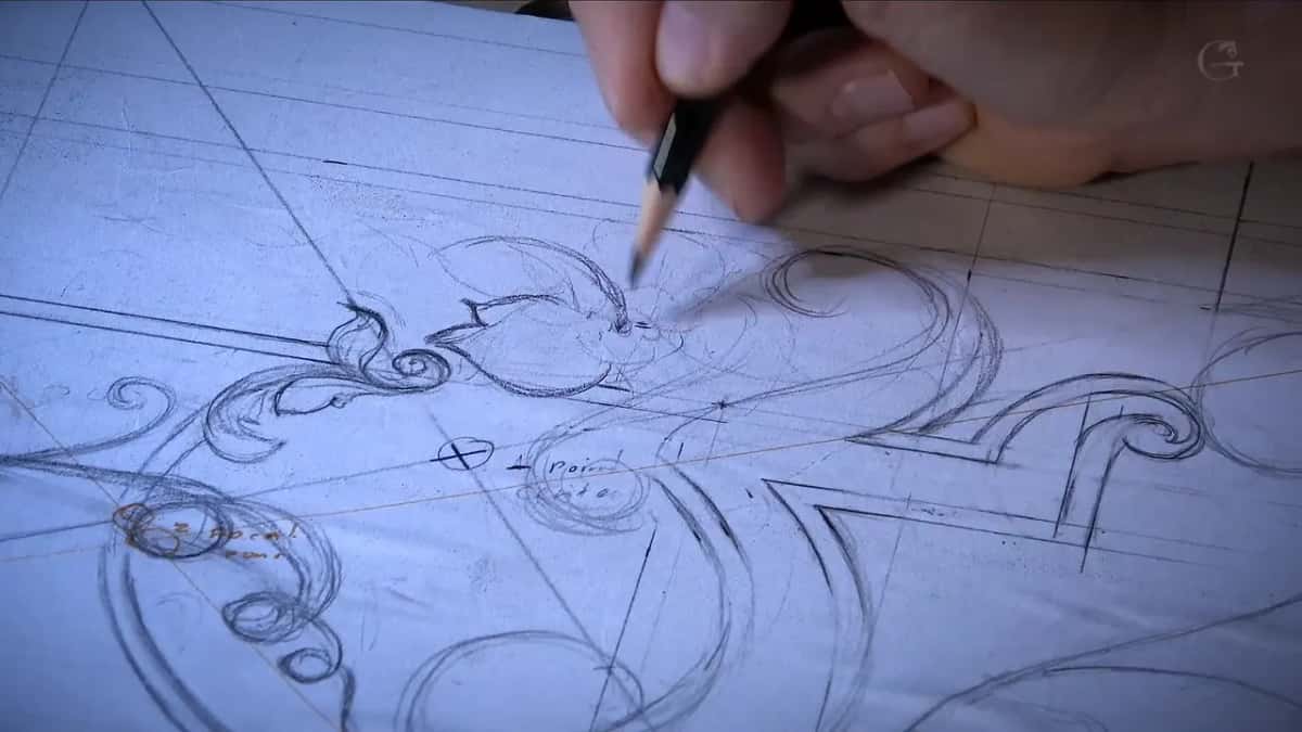 A bud shape under the pencil, a circled cross below it