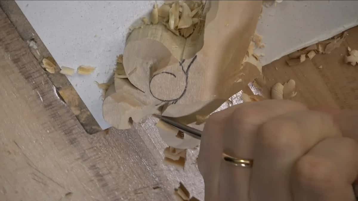 Gouge low beside the drawn scroll