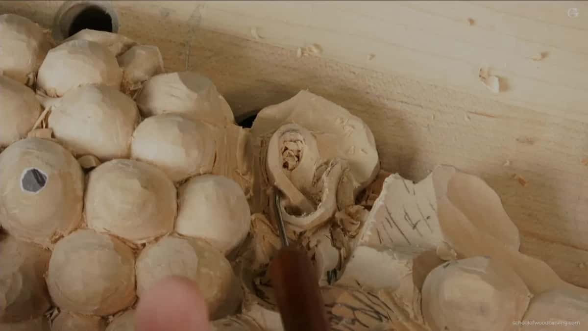 Brown handle at the bottom edge, thin blade in the hollow