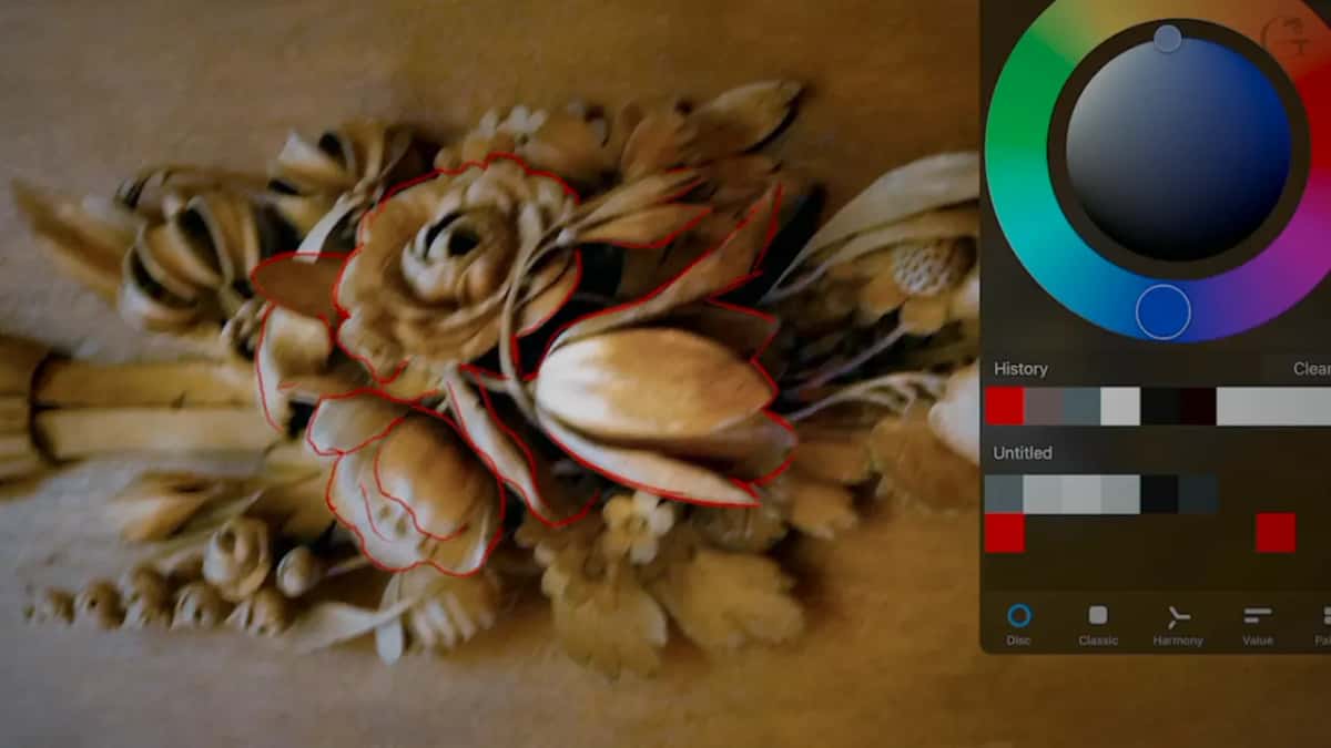 Color wheel open at the right of the tablet, red lines around the middle group of flowers