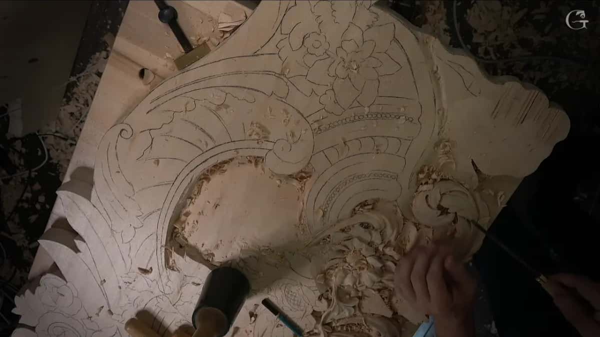 The whole board seen from above, pencil drawing over the upper part and a mallet near the bottom edge