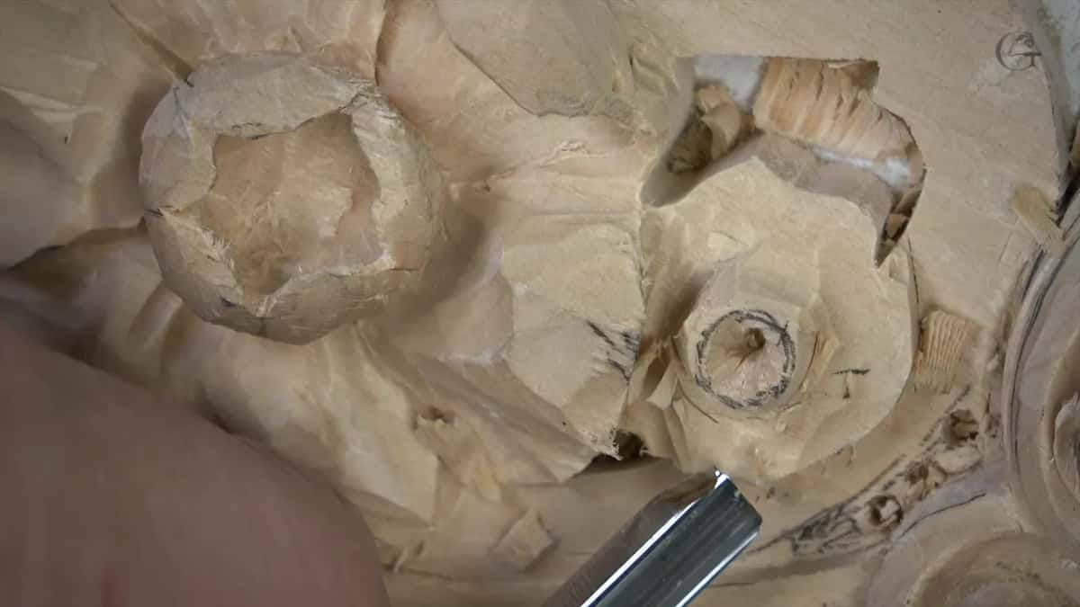 A gouge comes in low from the lower right