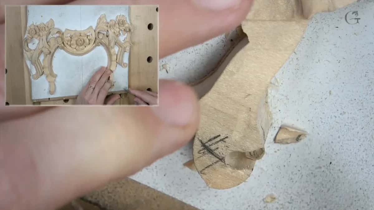 Fingertips pinch the loose piece