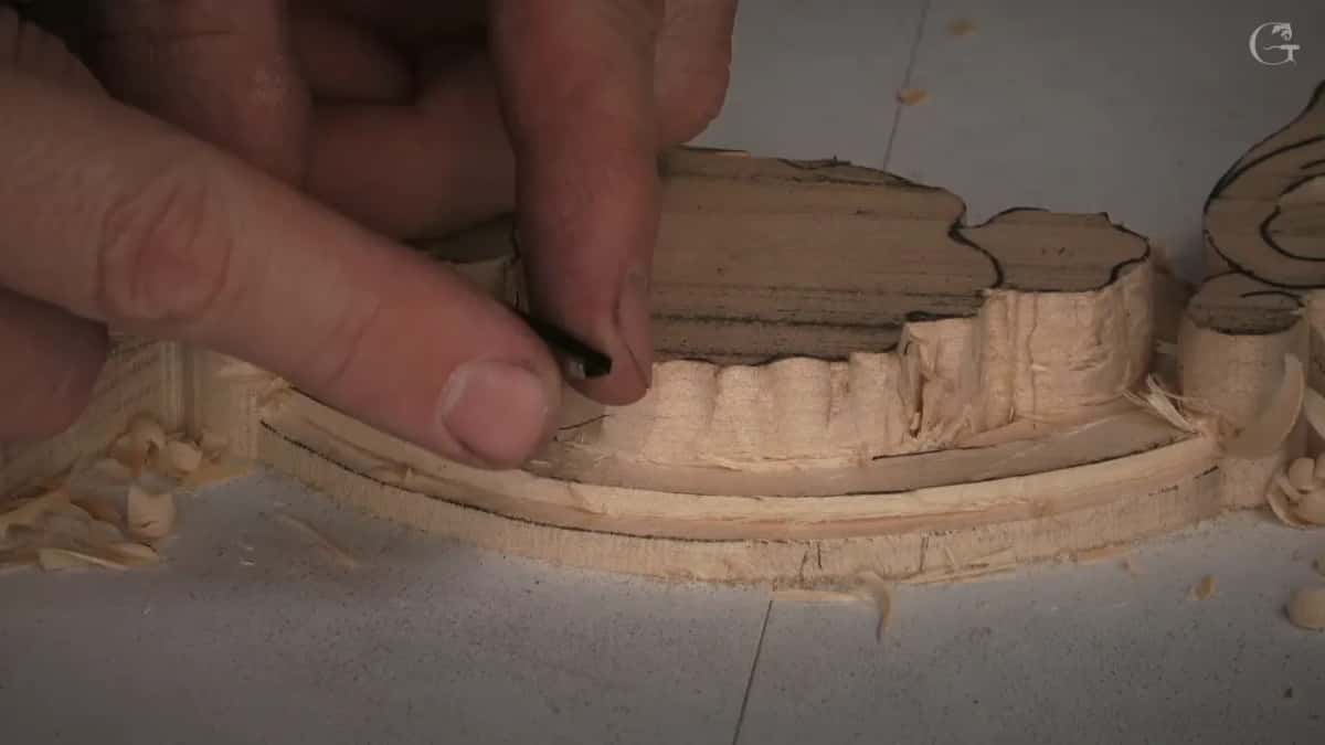 Finger and a small tool down inside the channel