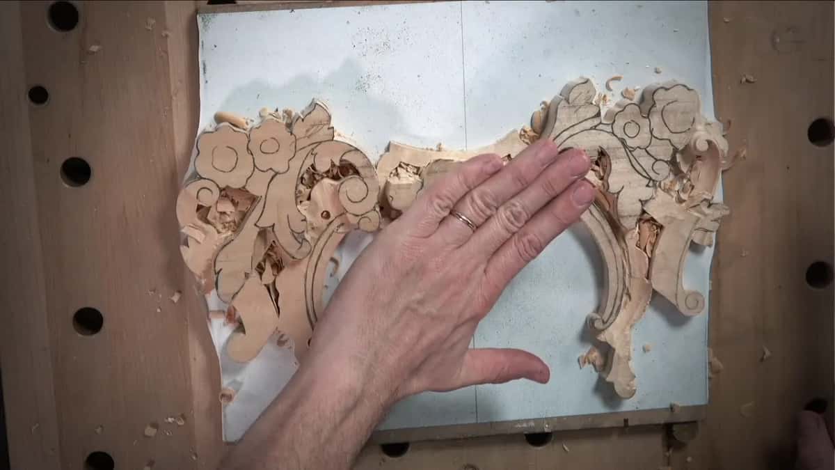 Open hand laid flat across the panel