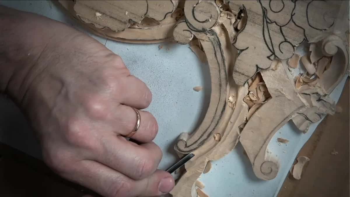 Narrow tool under his hand