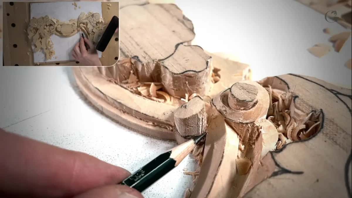 Pencil tip by a raised round stub, a phone in his hand in the corner view