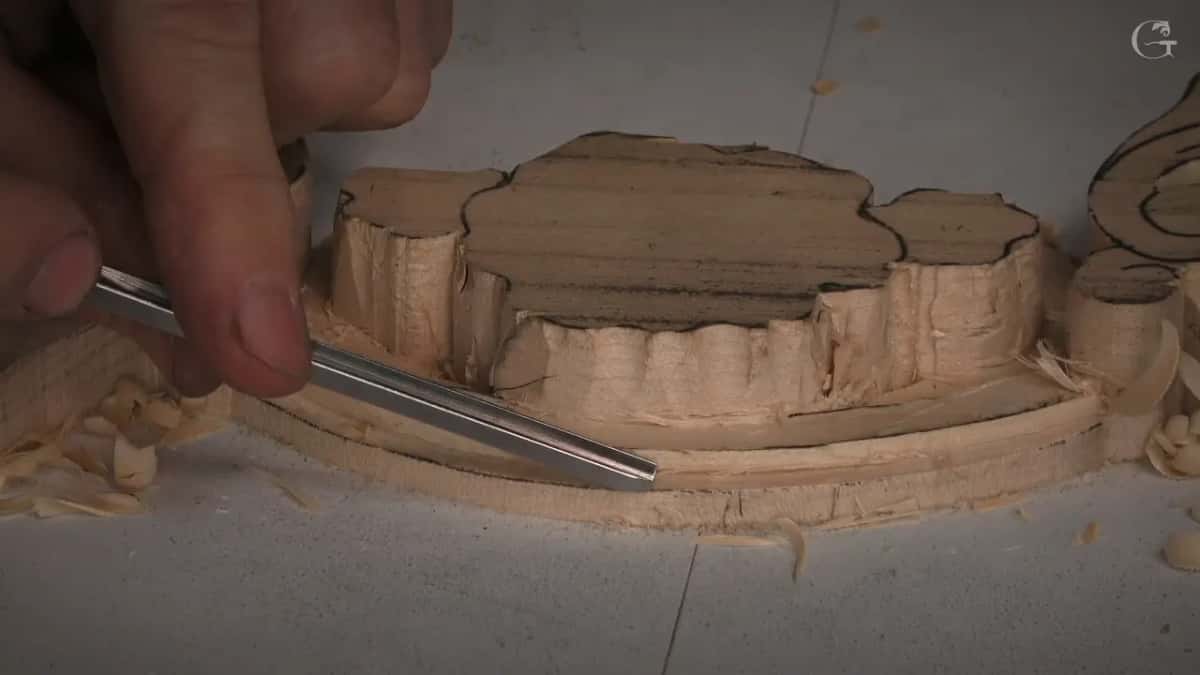 Long flat tool laid low along the foot of the raised center block