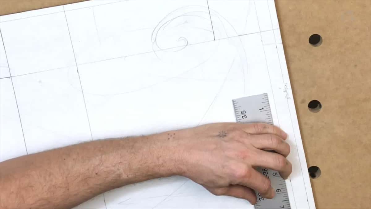 Forearm and rule down the far margin, layout lines running underneath