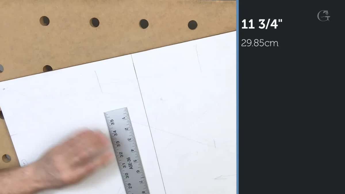 Rule lying across the paper beside a caption of eleven and three quarters
