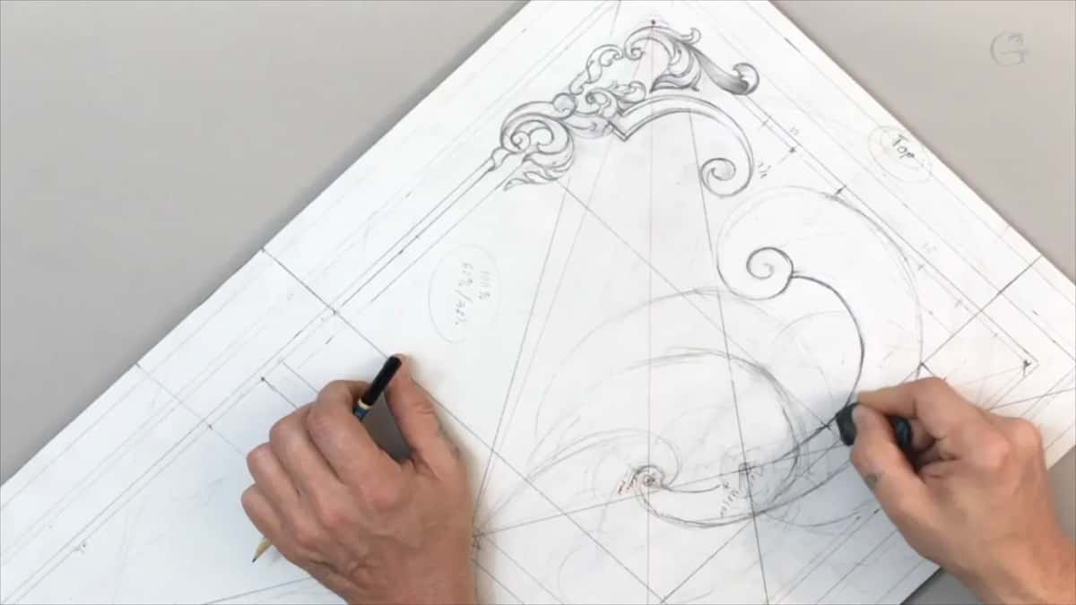 Pencil in the left hand, the right one at the big curve