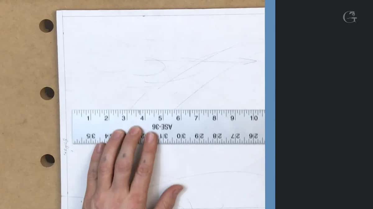 One hand pins a steel rule near the bottom as the shot fades into a dark title card