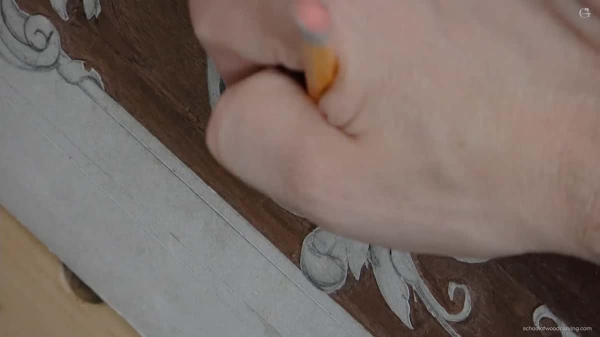 Yellow pencil in a fist
