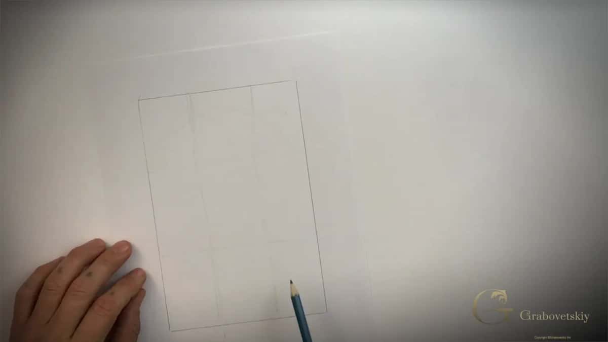 Box ruled in thirds both ways, a pencil point at its lower edge