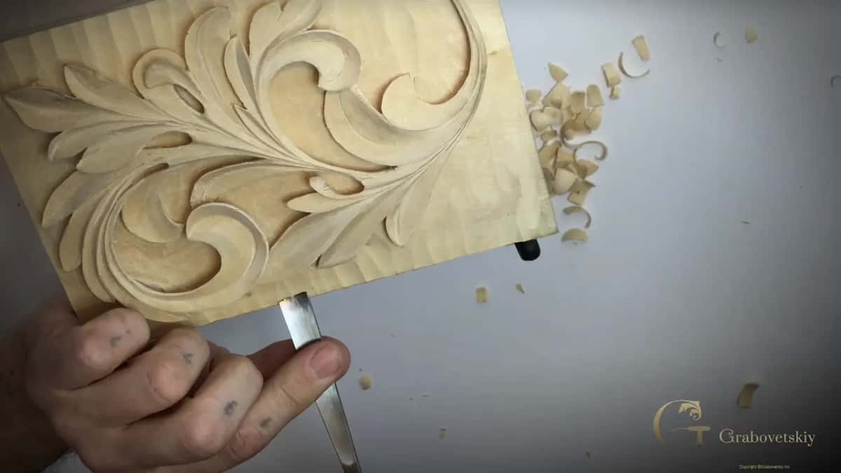 Fist around a handle below the board
