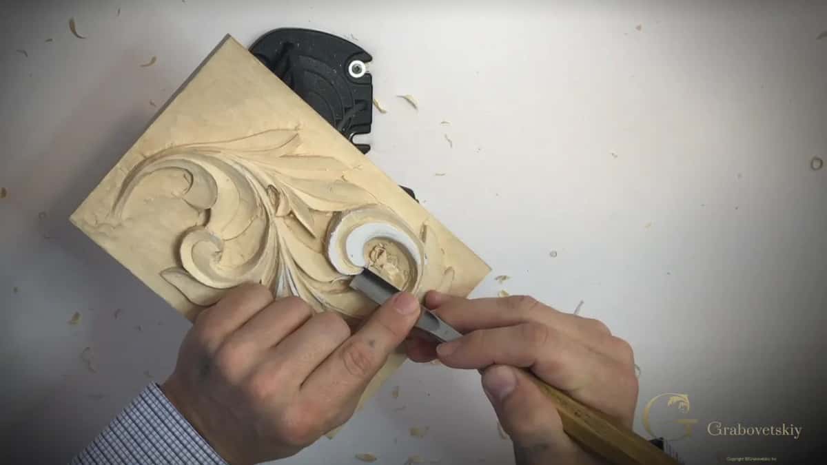 Long wood handle running off the lower right corner
