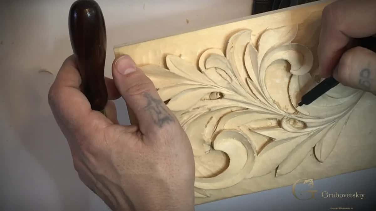 Dark round handle in one fist