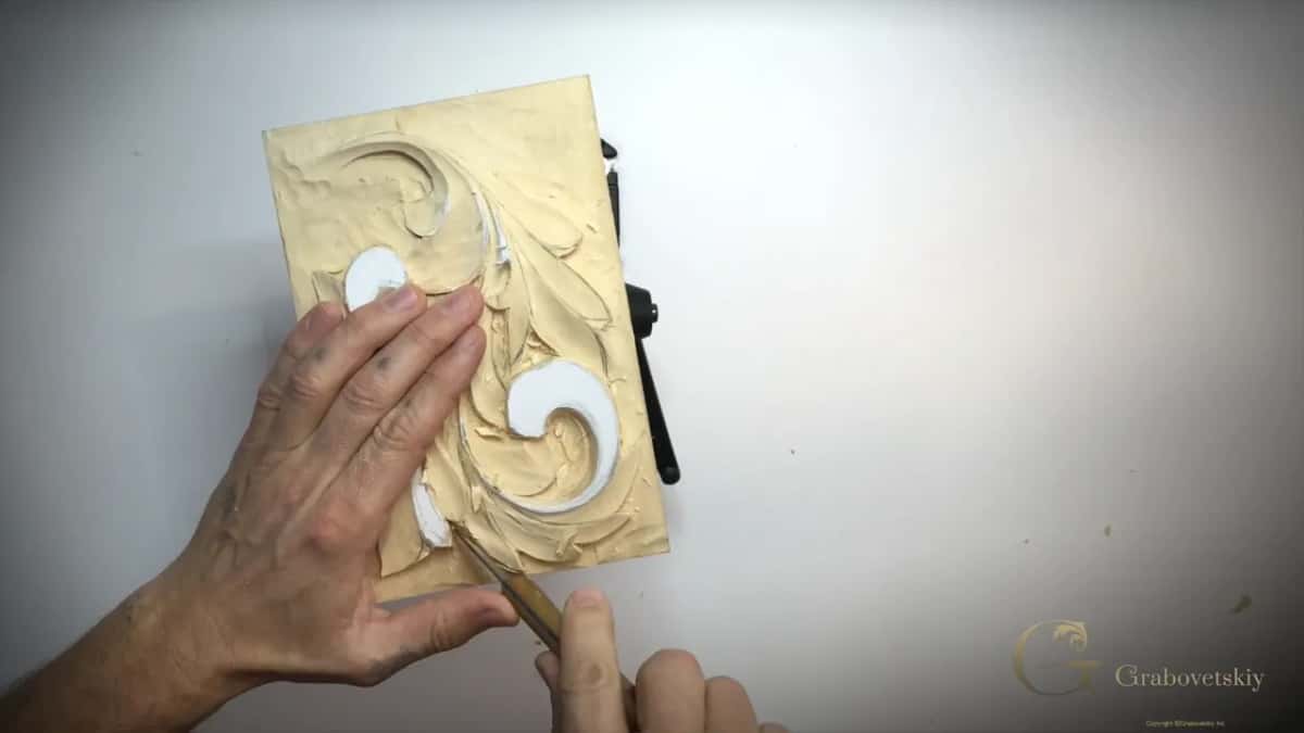 Wood handle working the lower curl