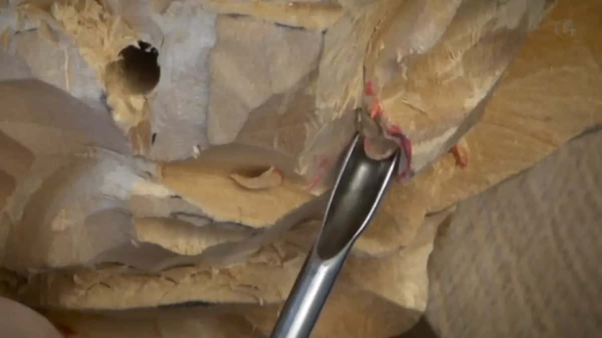 Gouge rising toward a red rim from below.
