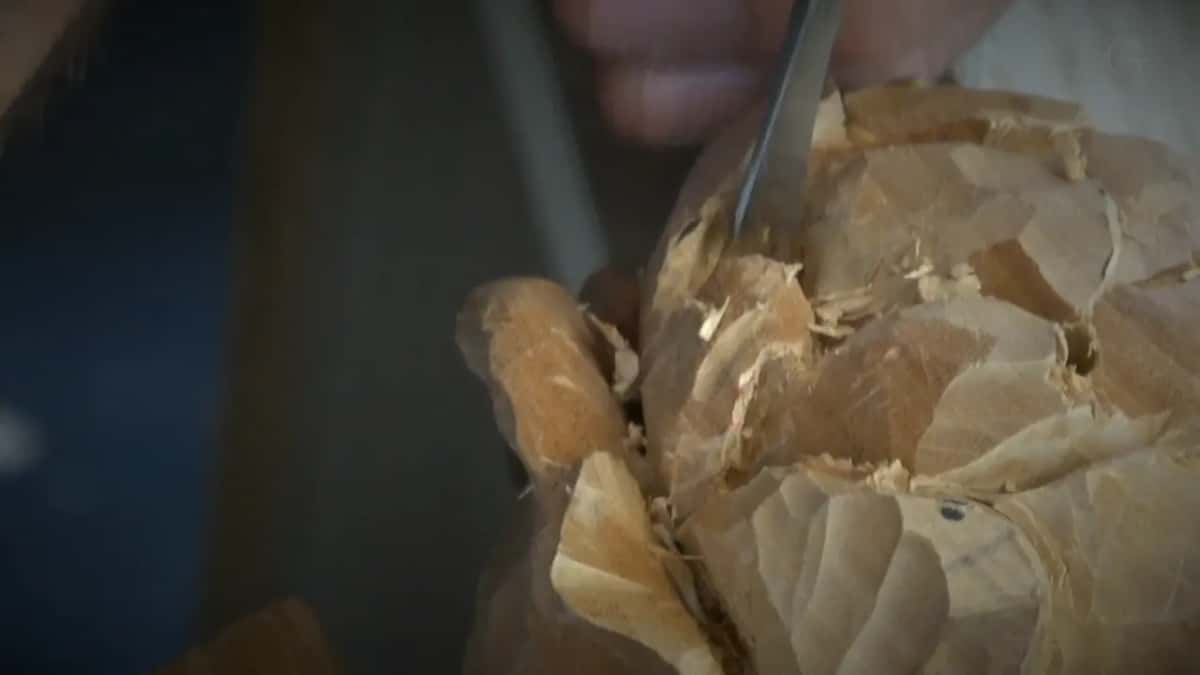 Blade at the top among loose chips.
