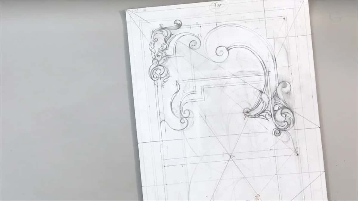 Upright sheet alone on the gray table, its bottom edge out of the frame
