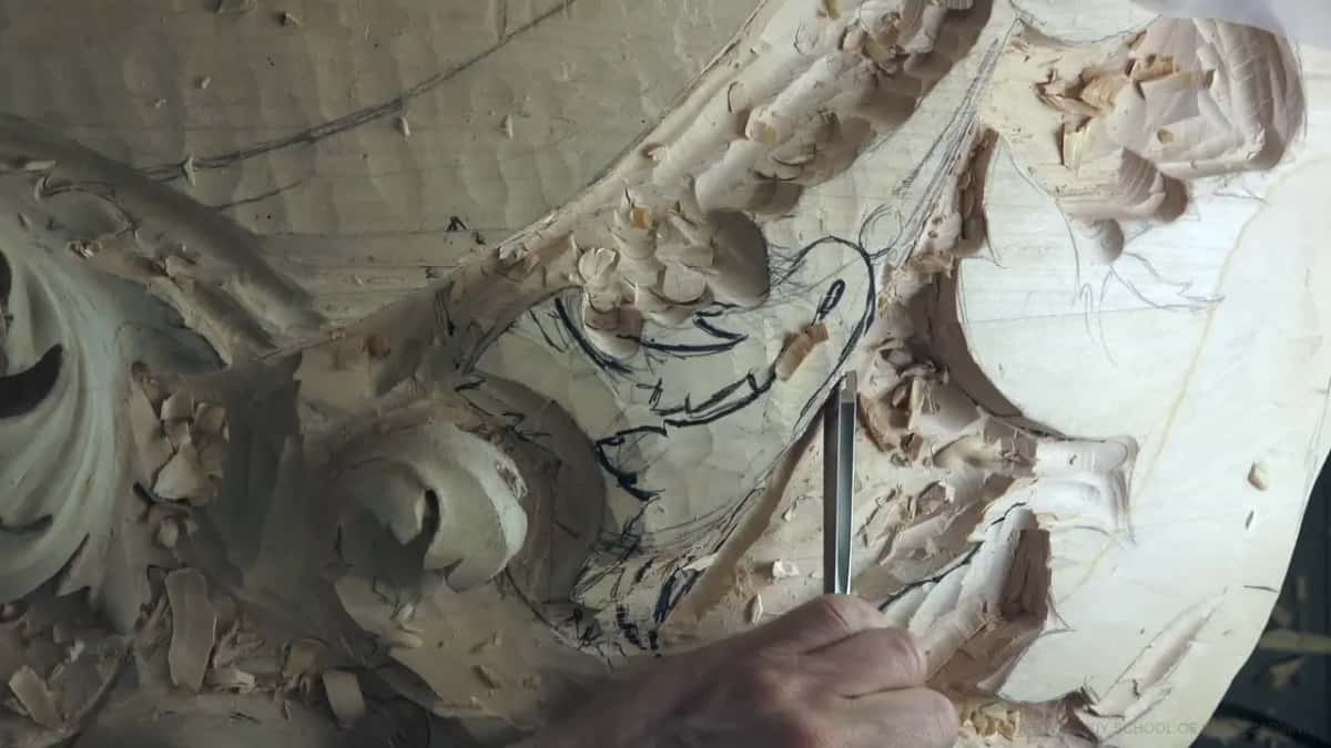 Marker lines trace a leaf on the other section, a tool held below them.