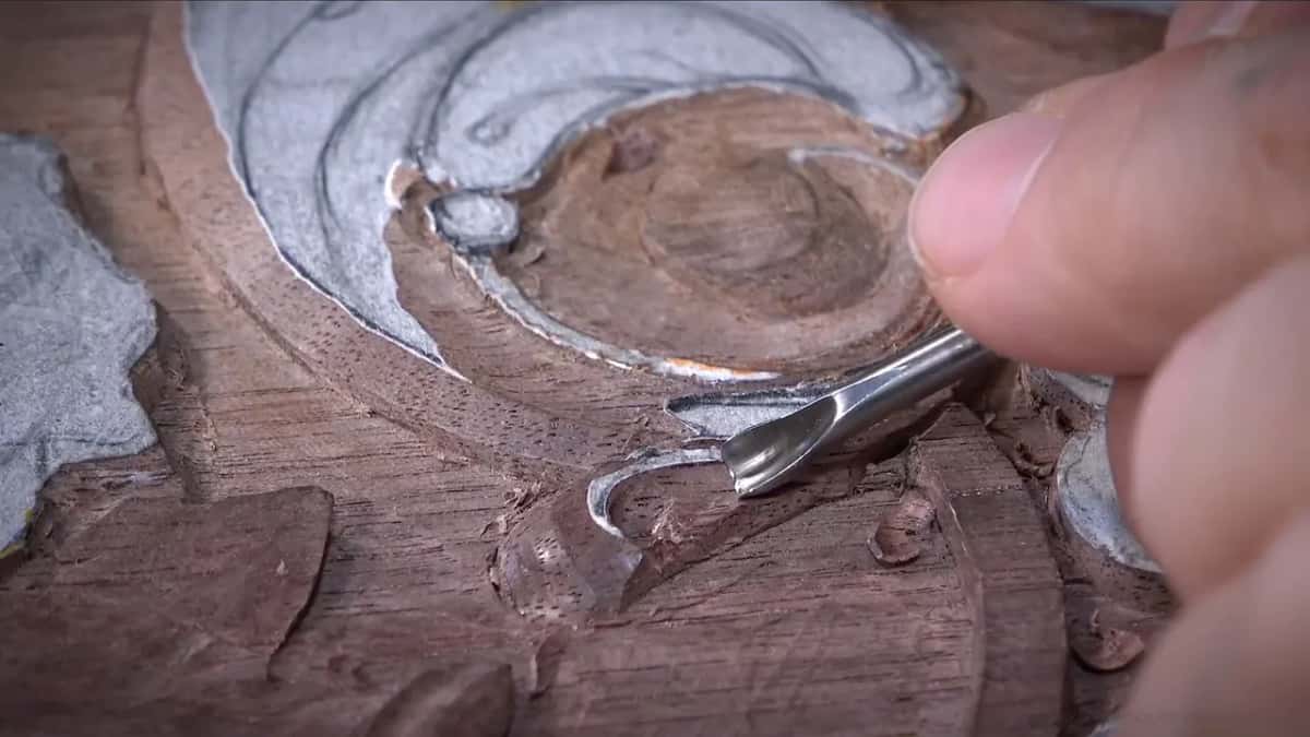 Gouge with a curl of shaving on its edge