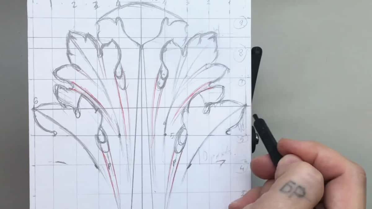 Close view of the two halves with red in the pipes and a dark stem down the middle
