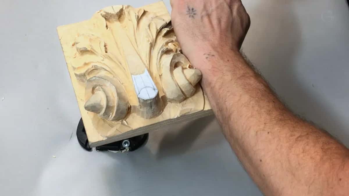 Tattooed hand on the panel