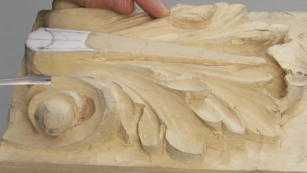 Blade coming in from the left edge, with the paper strip above