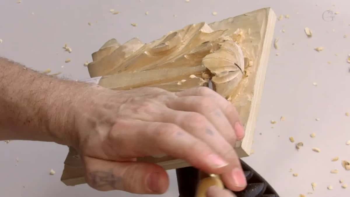 Hand spread flat on the panel's side