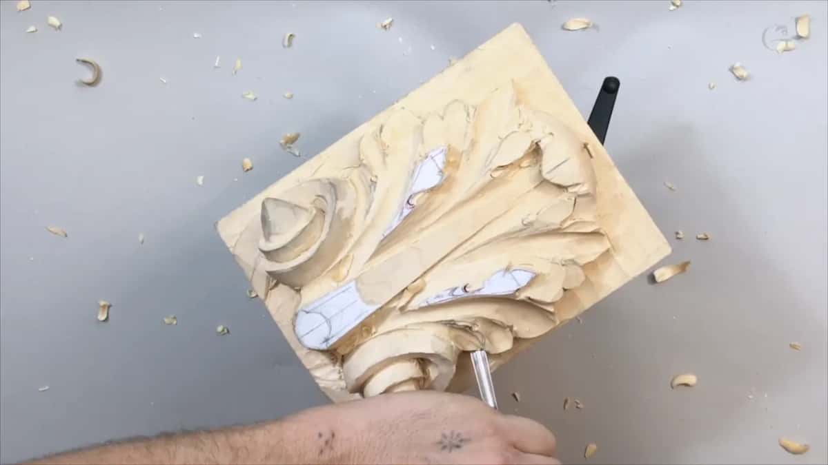 Small tool pinched upright by the volute