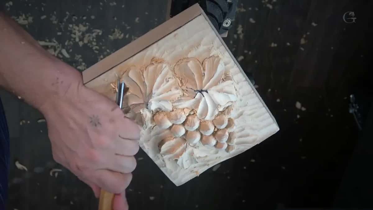 Gouge at the half carved cluster, chips scattered below