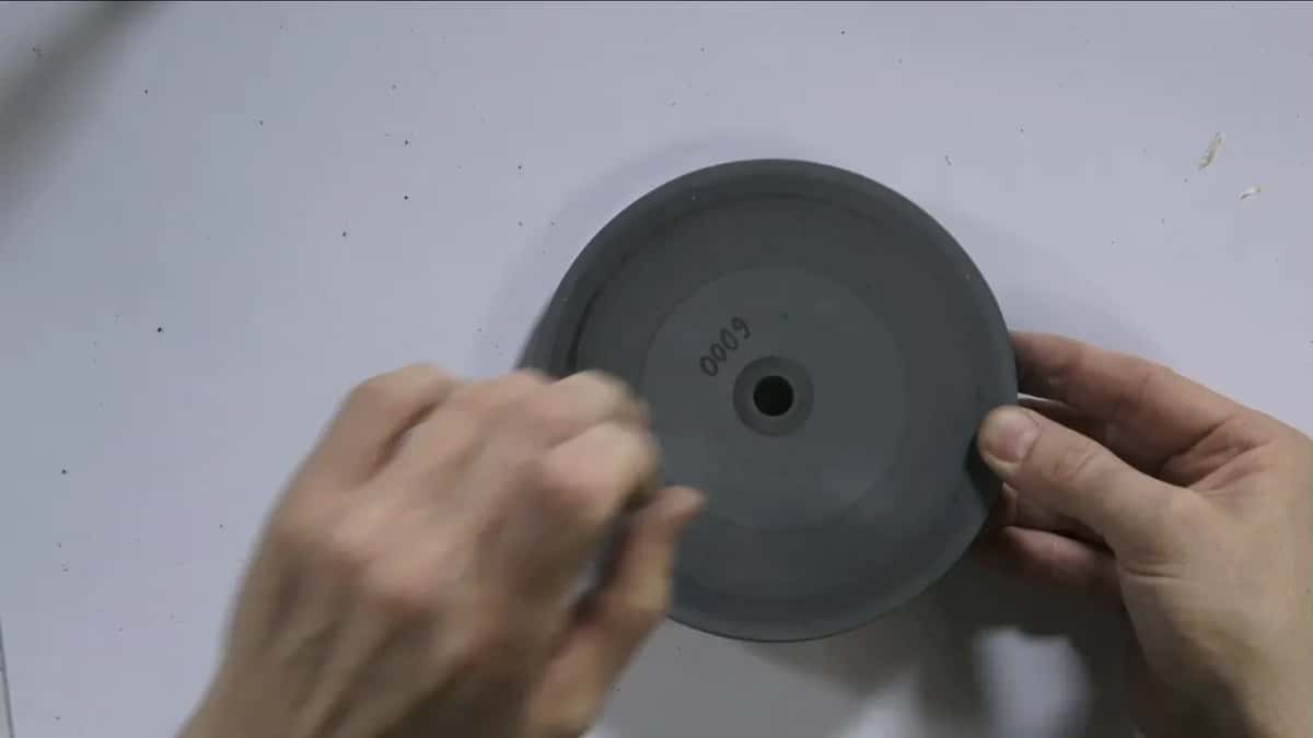 Gray wheel marked 6000 in felt pen.