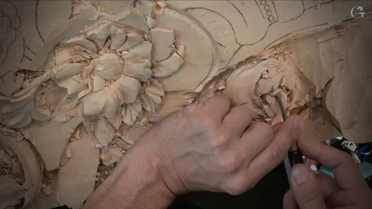 Two hands, one small tool