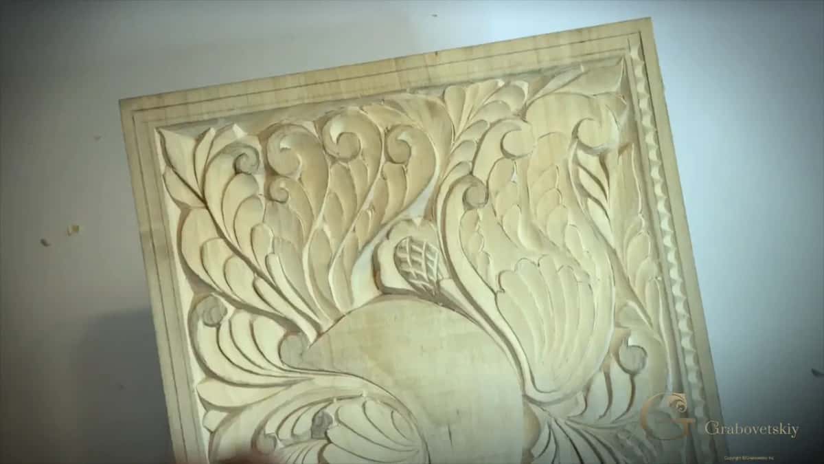 Board at a slant, scallops down its right edge