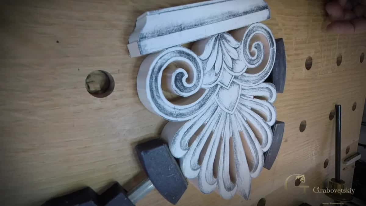Palmette blank pinned by three black pads.