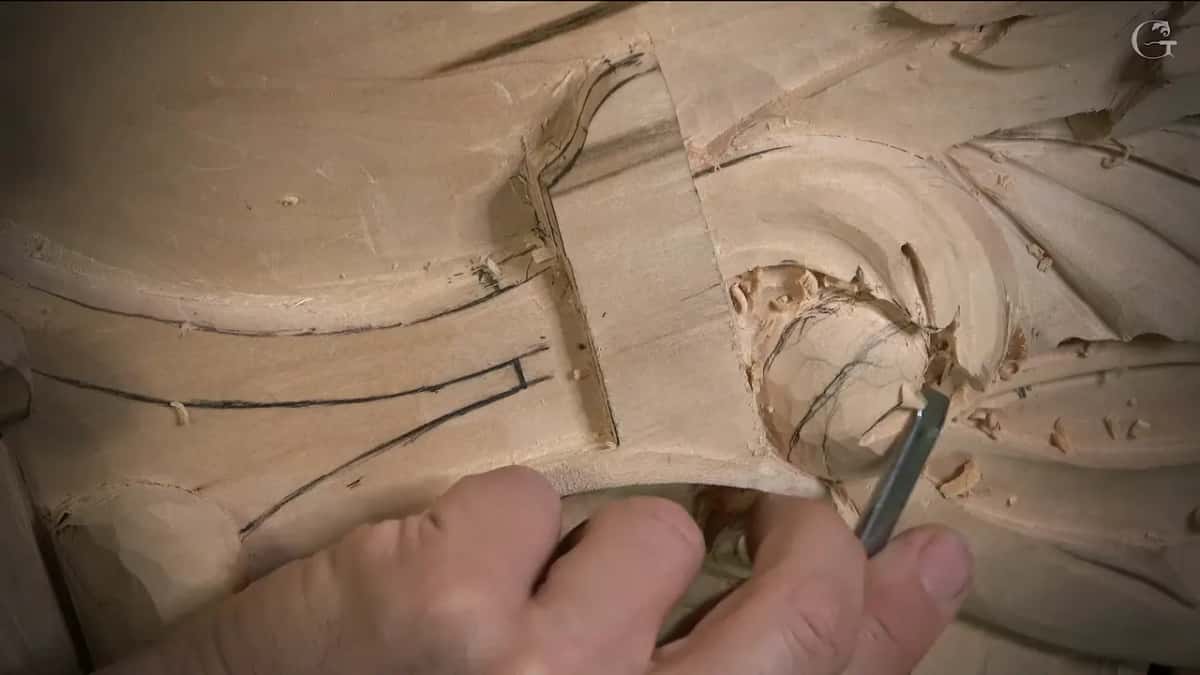 Flat tool runs along the curved ridge next to the eye, both pencil lines still showing to the left