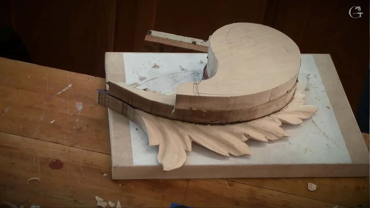 Two more layers glued onto the carved first layer, seen low from the front edge of the backing board