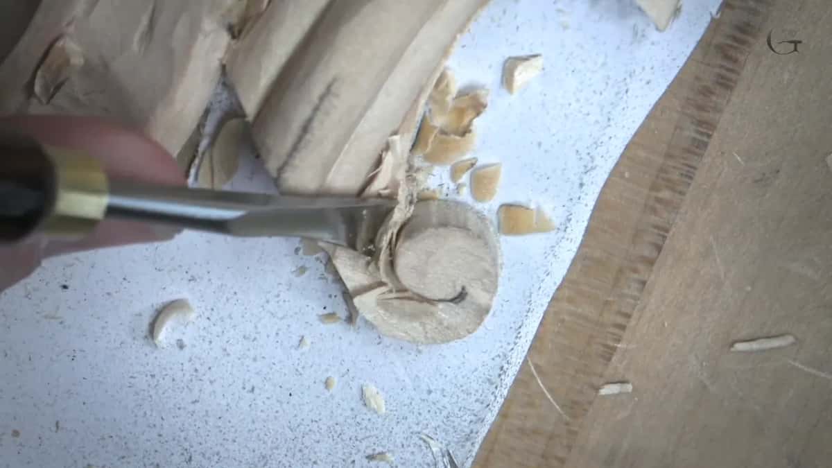 Brass ferrule and steel slicing chips off beside a round spiral stub
